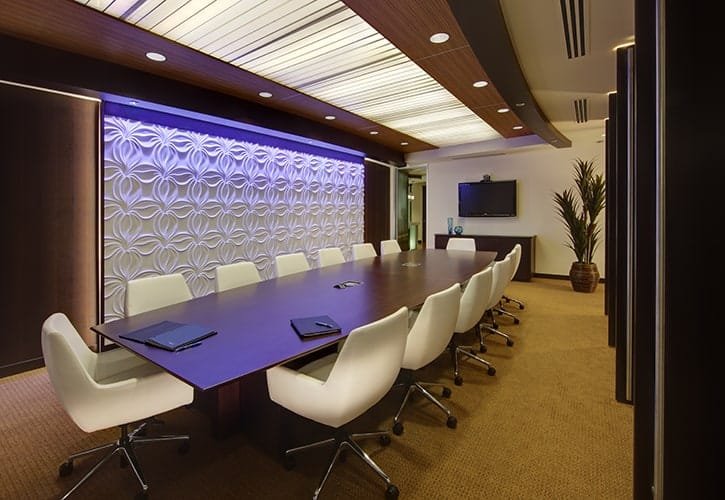 Modern conference spaces can include a variety of furniture, and serve to express the corporate identify as shown in this photo for a consumer bank branch office in Madison, Wisconsin