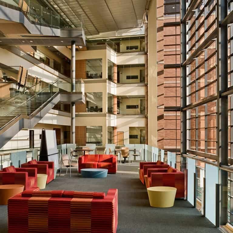 University of Wisconsin-Madison Microbial Sciences Atrium and Student Commons, featuring school colors, encourages students to linger and work together.