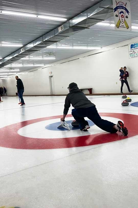Architect Brian Scheibel in the zone curling with his PRA Milwaukee Design Office Teamm