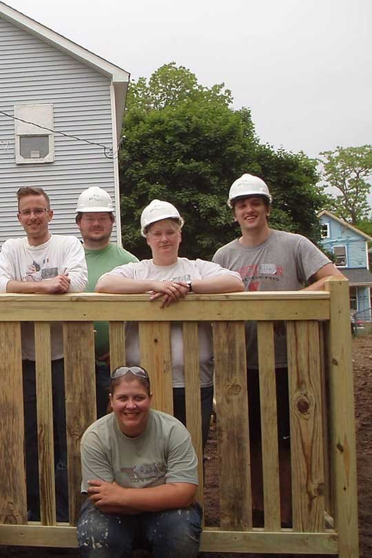 Erin Ankebrant and PRA team contributing to their community by helping build houses