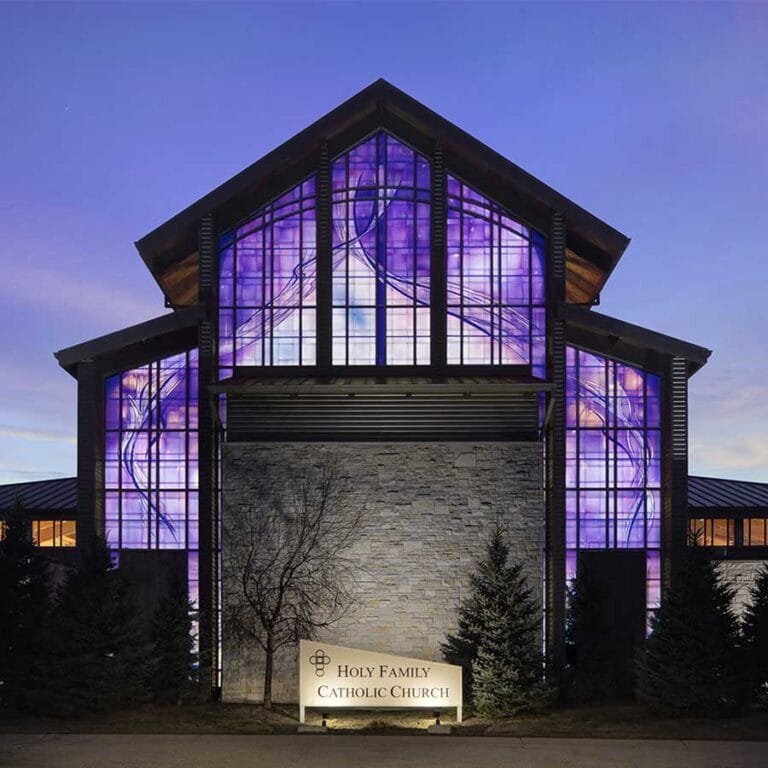 Holy Family Catholic Church Exterior in Fond du Lac, Wisconsin, illustrates the impact of contemporary stained glass on the neighborhood