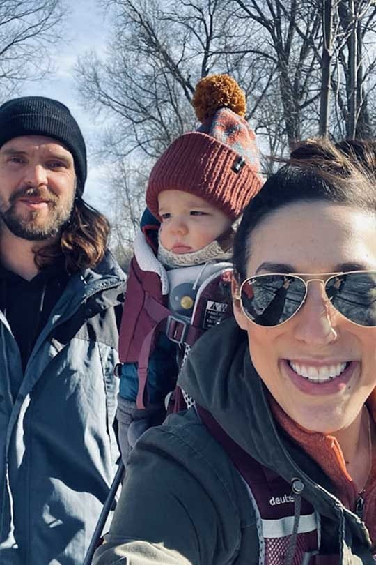 Architect Molly Ryan with her family hiking through Wisconsin Winter