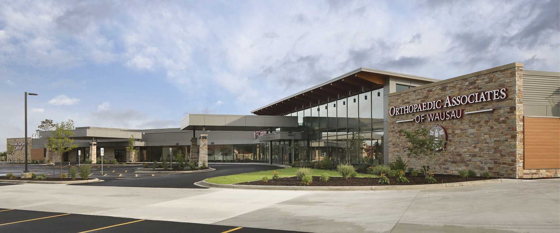 A new Ambulatory Surgery Center and Clinic: Orthopedic Associates of Wausau Orthopedic & Surgery Center Exterior with Natural Materials and Individual Entries