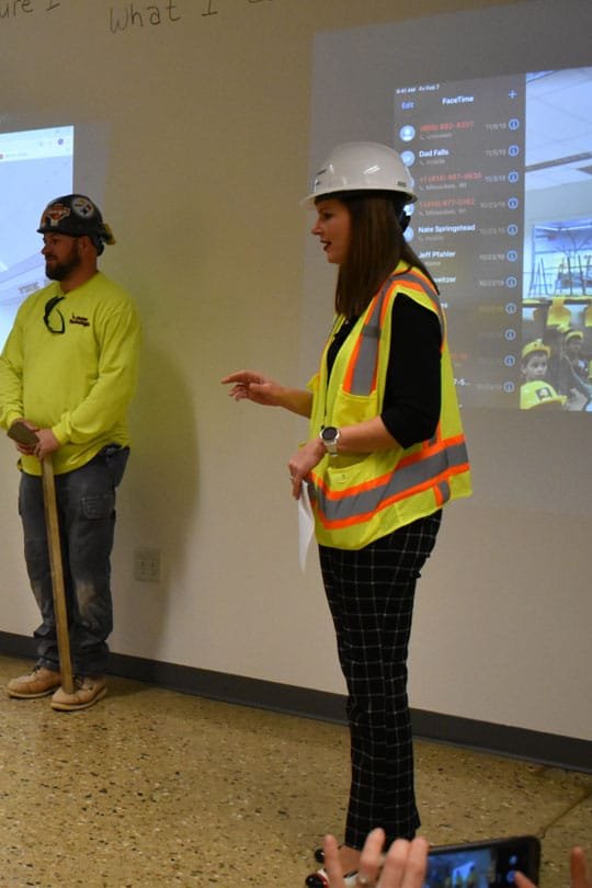 Director of Education Strategy Dr. Melissa Thompson provides background information during a construction tour